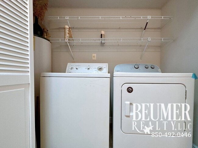 Building Photo - Move-In Ready Intercoastal Waterfront Townhome Steps to the water