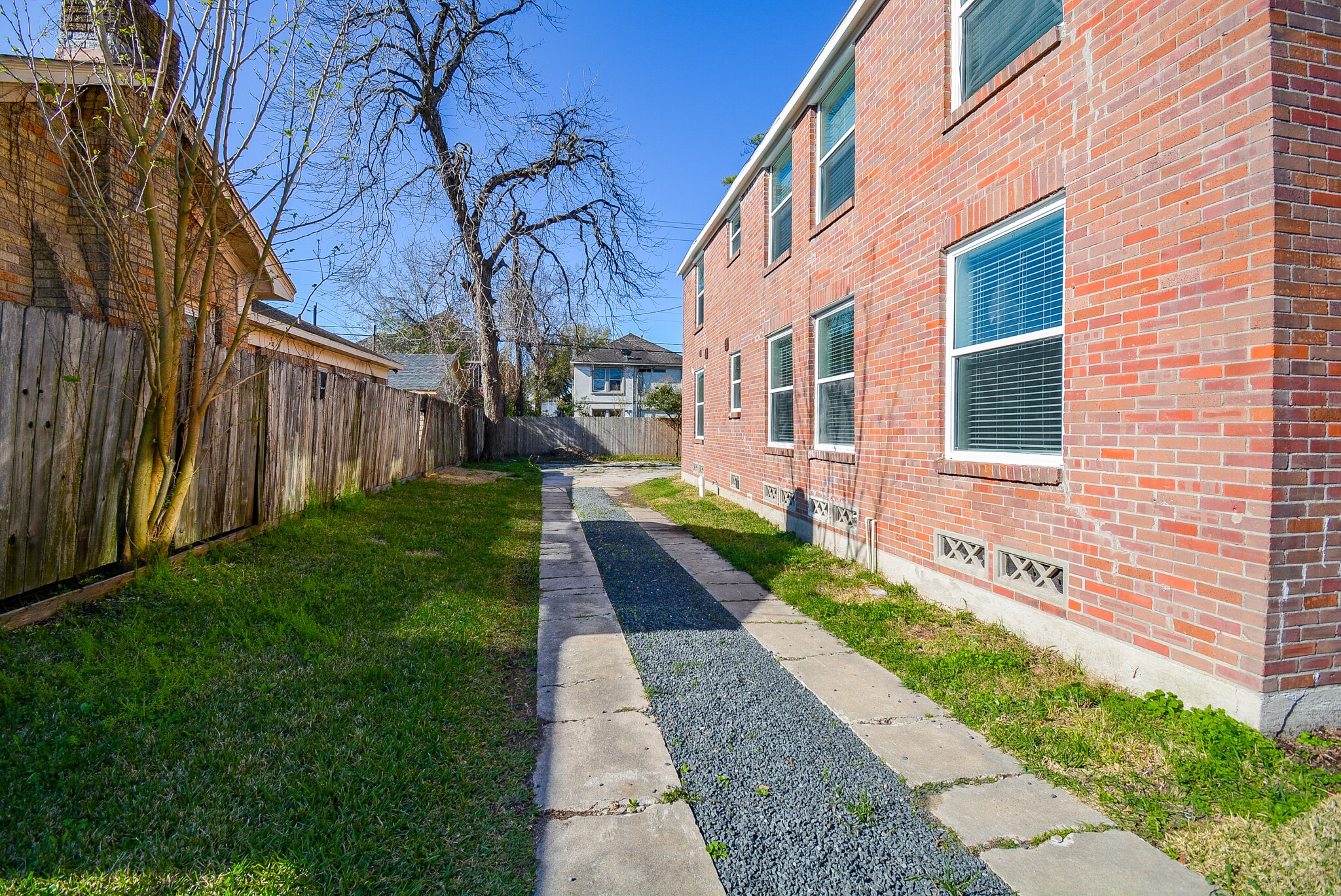 Shared side driveway leads to rear parking - 2916 Arbor St