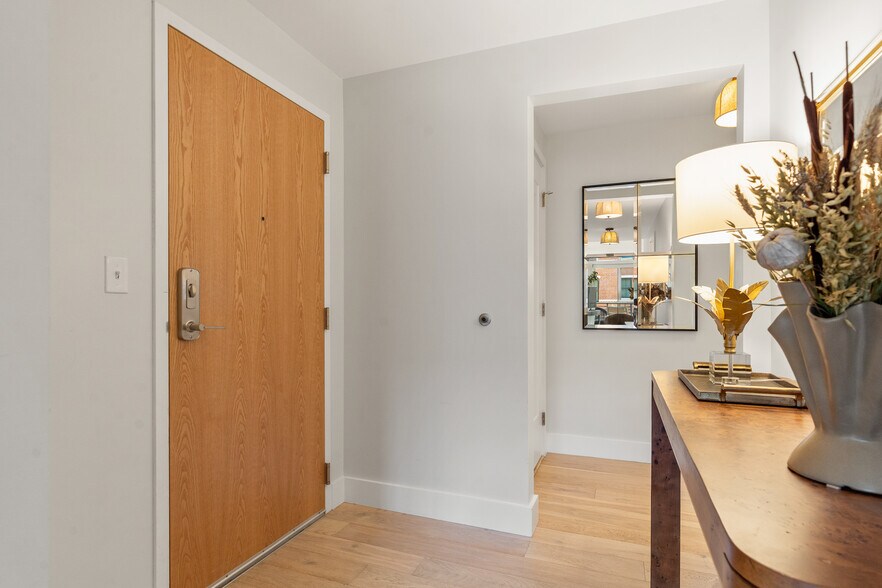 Back hallway, to the left of the entrance, houses the 2 ensuite KING bedrooms - 383 Commercial St
