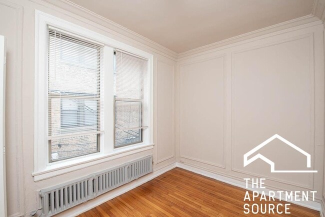 Building Photo - 1365 W Estes Ave