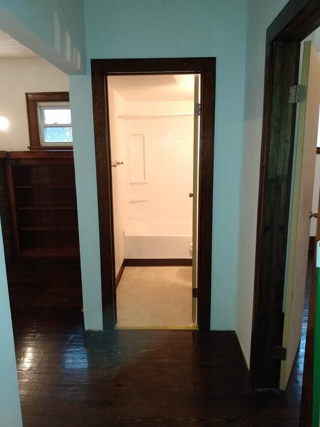Looking into the bathroom, bedroom is on the left and bedroom on the right. - 3317 Overbrook Dr
