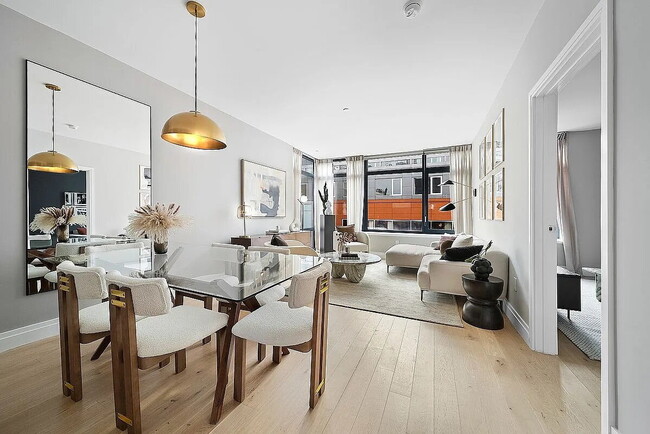 Building Photo - "Luxury 1-Bedroom Oasis with Pool & Elegant Finishes in Prime New York Location!"