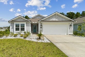 Building Photo - Modern 4BR Home with 3 Full Baths in River Glen | Screened Porch & Resort-Style Amenities