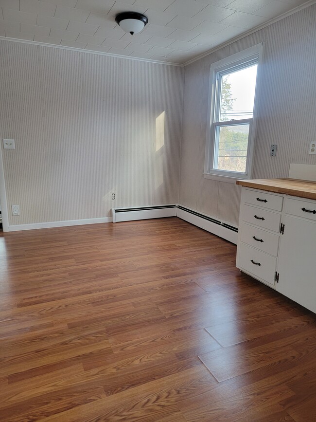 Dining area adjacent to kitchen - 383 East St