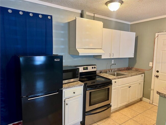 Building Photo - 5521 Axiom Ave