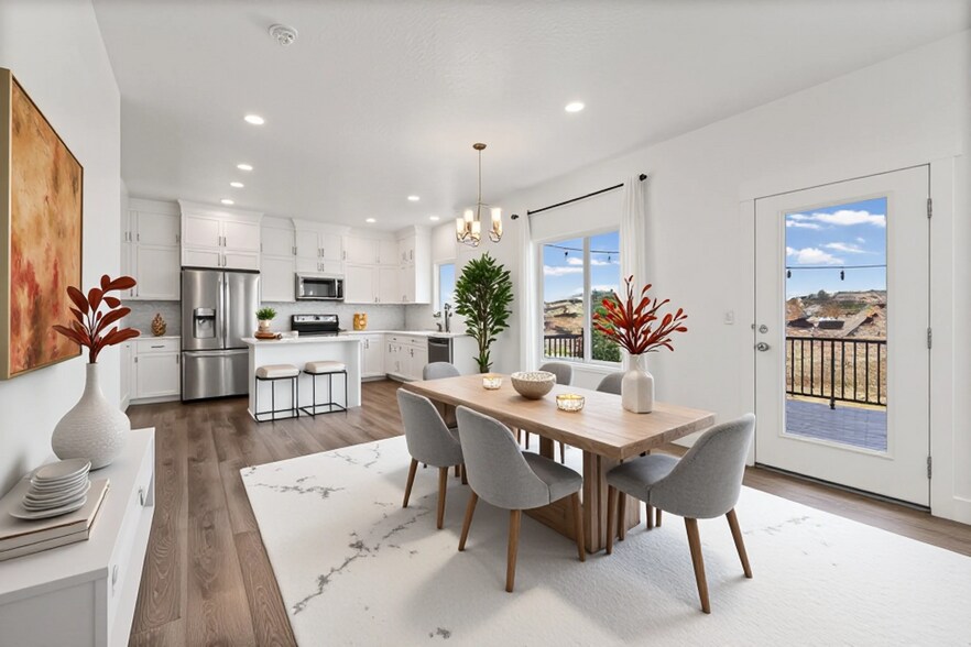 Open concept dining/kitchen - 4877 E Silver Ridge Rd