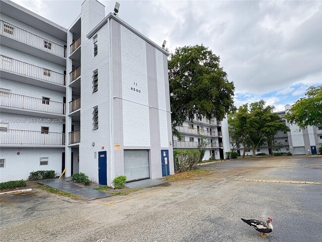 Building Photo - 8550 N Sherman Cir