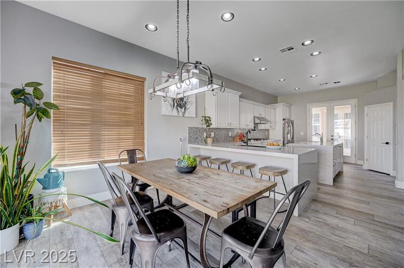 Dining Area/Kitchen - 9738 Bear Trap Ct