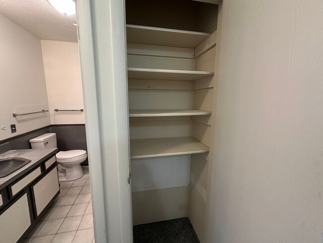 Building Photo - Spacious, three level, 4 Bed 2.5 bath Townhome in Ammon right behind the Walmart on Hitt.