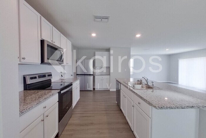 Building Photo - 8675 SW 43rd Ter