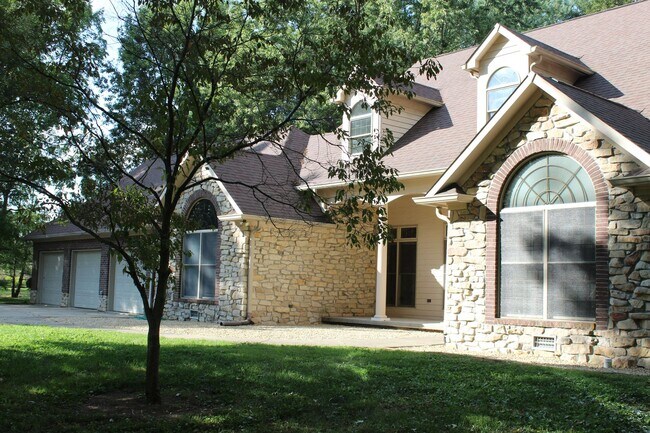 Building Photo - Available Now! Stunning Custom 4 Bedroom H...
