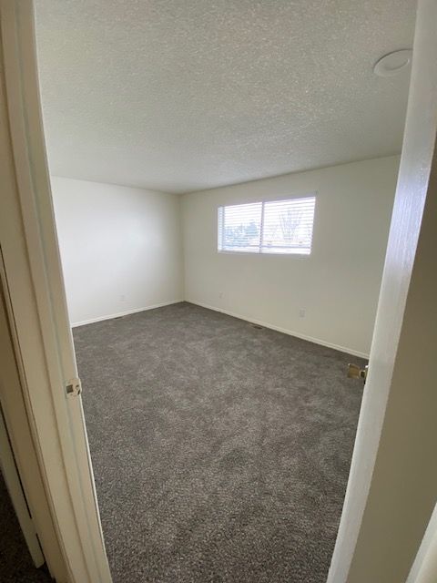 second bedroom with walk in closet - 1205 W Ivy Ave