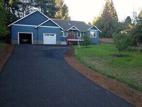 Building Photo - Custom Hillsboro Ranch with Gourmet Kitchen, Dual Fireplaces & Upgraded Finishes!