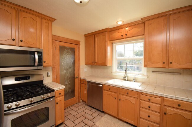 Building Photo - Amazing Home in Millcreek with Backyard Oasis!