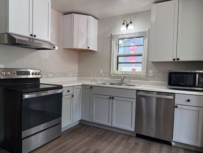 Building Photo - 704 8th St S