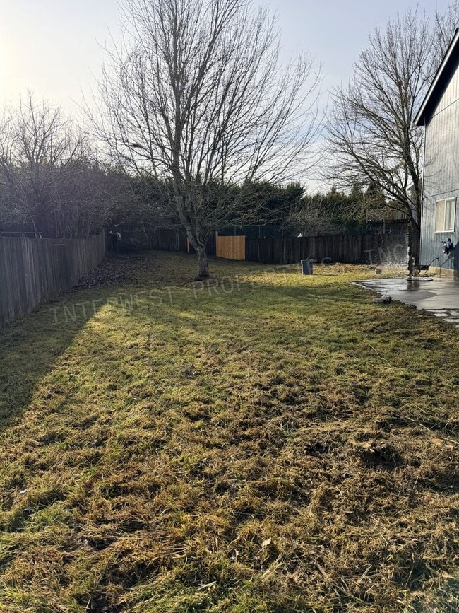 Building Photo - Remodeled 3 Bd Home W/ Washer & Dryer Hook-ups, Large Fenced Backyard, Gas Fireplace & 2 Car Garage!