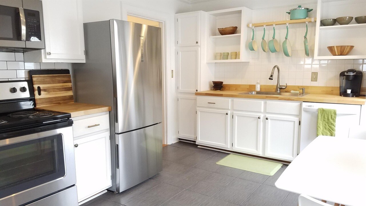 Remodeled kitchen ft. butcher block counter top - 1236 Sunnymeade Dr