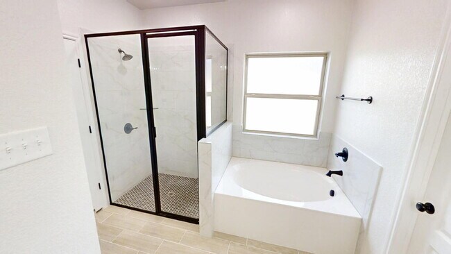 Building Photo - Welcome home to this beautifully designed 4-bedroom, 2.5-bathroom gem!