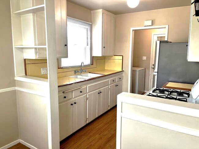 Building Photo - 2BR 1BA Allied Gardens Home - Hardwood Floors, Washer/Dryer, 2 Car Garage, HUGE backyard, 2 Pets ...