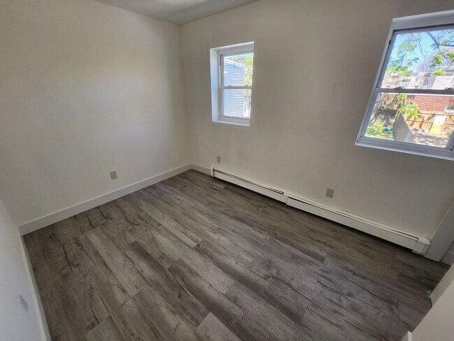 Building Photo - Row Home For Rent with Fenced in BackYard