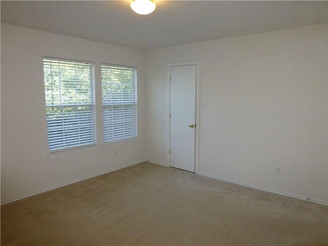 Building Photo - Generous Four Bedroom, Three Bath Home with Large Yard