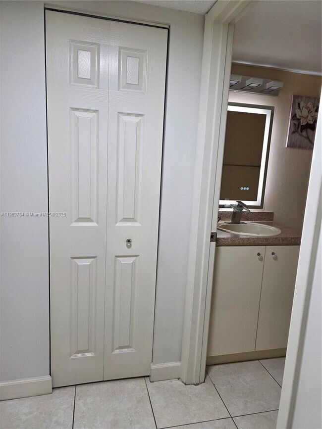 Building Photo - 9917 W Okeechobee Rd