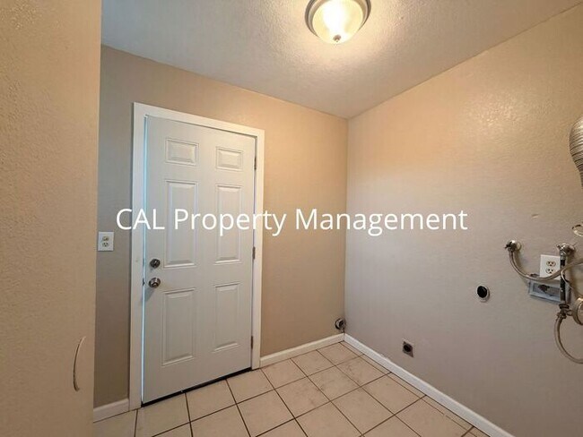 Building Photo - Spacious 4-Bedroom Home with 2-Car Garage & Backyard Oasis