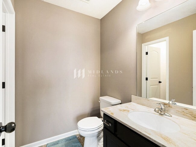 Building Photo - 1.5 story in Ashford Hollow