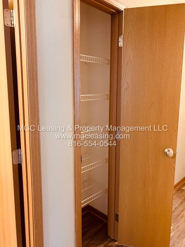 Building Photo - Charming Brick Ranch Duplex in the Heart of Lone Jack - Ready Now