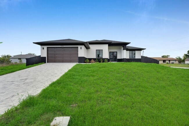 Building Photo - Brand-New Pool Home for Rent – Port Charlo...