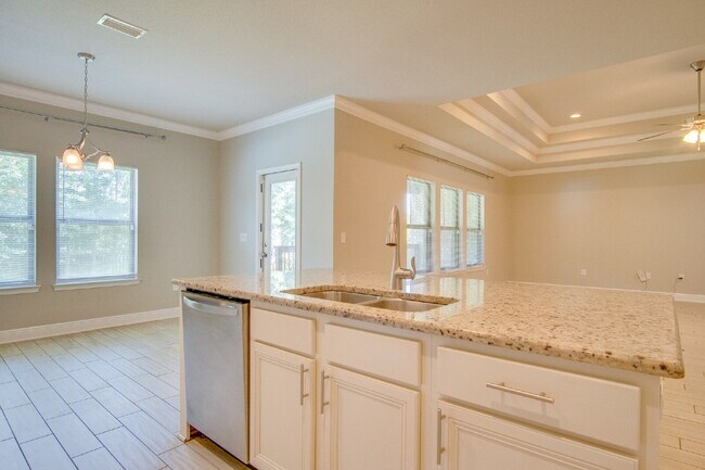 Building Photo - Spacious 4BR Pool Home with Modern Upgrade...