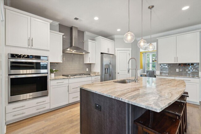 Building Photo - Impressive home in Oakfield loaded with up...