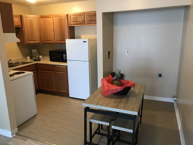 Kitchen/Dining area with washer/dryer closet and hook ups. *Not Furnished - Woodstock Terrace