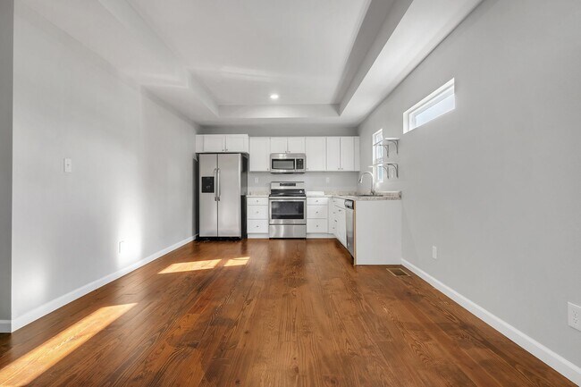 Building Photo - Modern Comfort Meets Prime Location — Styl...