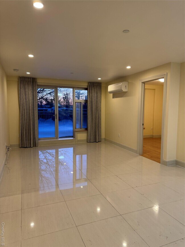 Building Photo - 65-38 Austin St