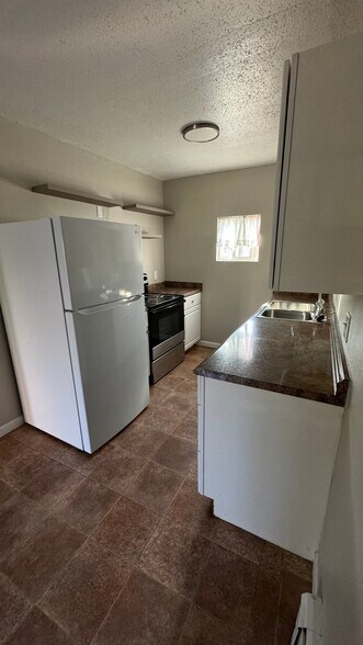 Building Photo - 635 10th Ave