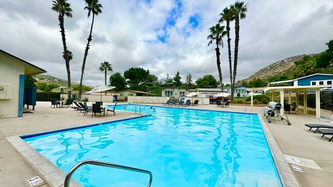 Building Photo - Light, Bright, and Freshly Updated Home in the Gated & Desirable Champagne Village 55+ Community!