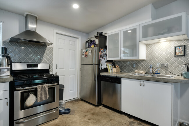 kitchen corner and second door to exterior private yard - 1606 Valleyridge Dr