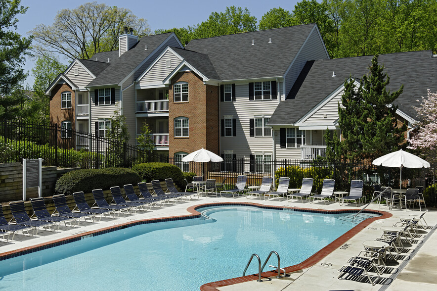 Swimming pool and sundeck with lounge seating - eaves Fairfax City