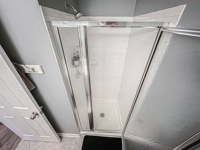 Building Photo - Stylish 3 Bed 3 Bath Condo With Large Balcony in Desired Riverbend at Cascades - Water Included