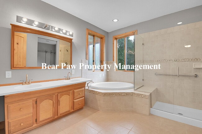 Building Photo - Spacious 4-Bedroom Retreat in Scenic Conif...