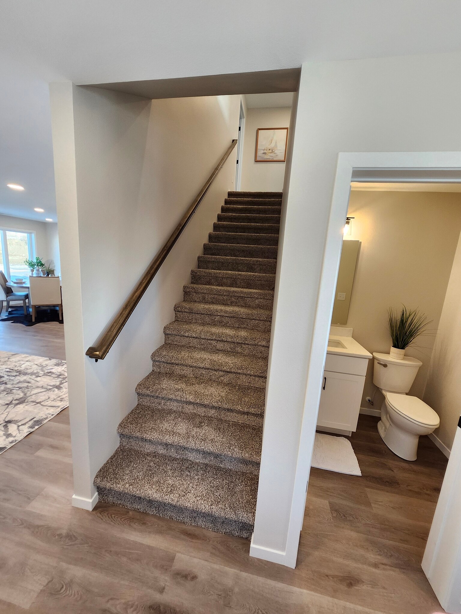 Stairs off the main entrance hallway leading to the upstairs - 5312 Welder Ave