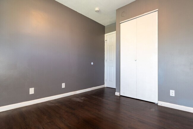 Building Photo - This charming 5-bedroom, 2-bathroom home is available for $2,000/month.
