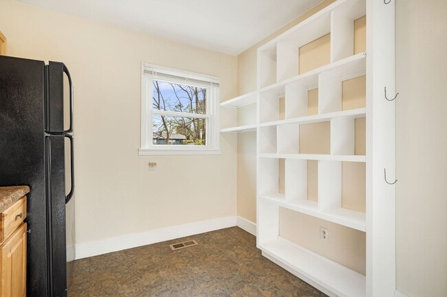 Building Photo - Sunny 2-Bedroom Home with Fenced-In Yard a...