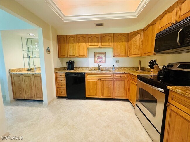 Building Photo - 6760 Pelican Bay Blvd