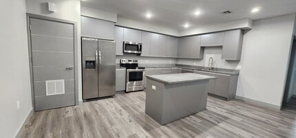 Building Photo - 7040 Woodman Ave