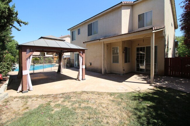 Building Photo - Cute Two-Story Home With Pool & RV Parking