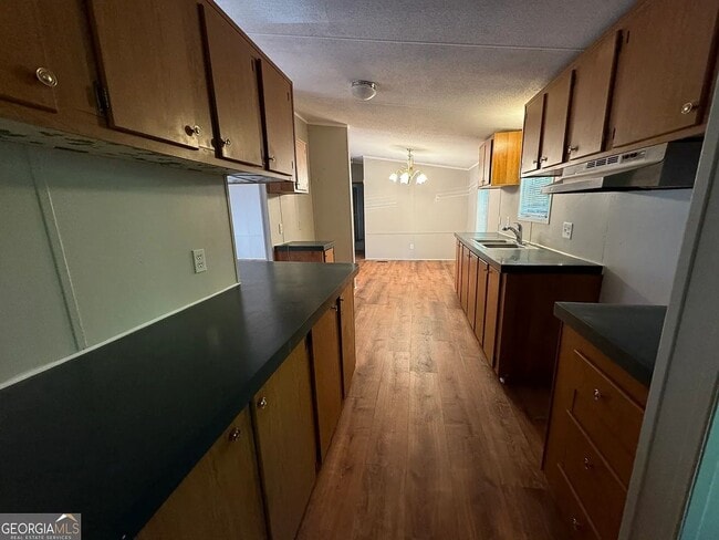 Building Photo - Rent Reduced!