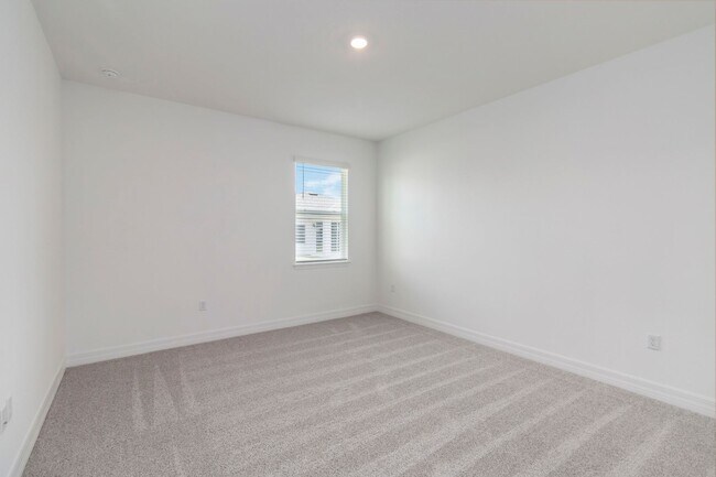 Building Photo - Beautiful Brand New Energy Efficient 4/2 C...