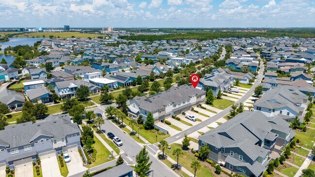 Building Photo - Move In Ready End Unit Townhome in Laureate Park | 3 Bed | Tesla Charger